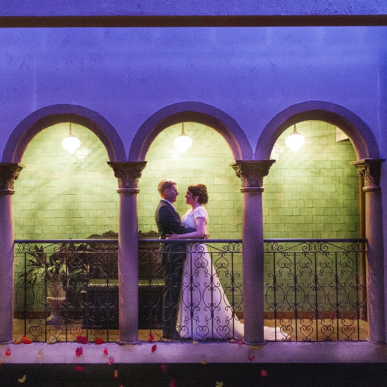 Close-up shot of married couple on their wedding day on the Balcony
